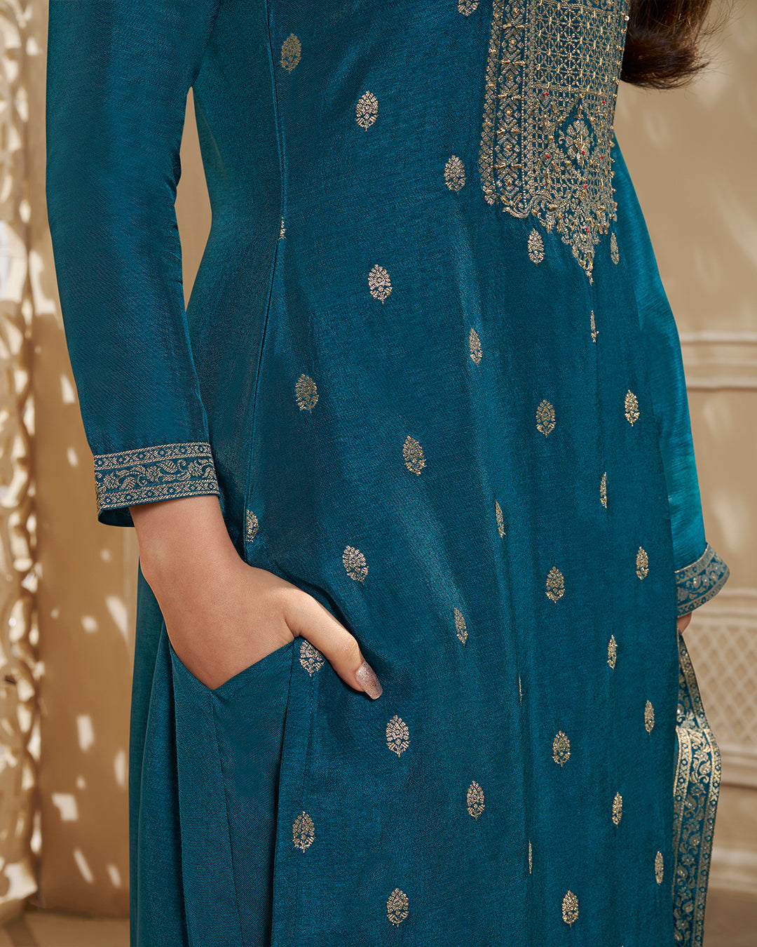 Cerulean Blue Dola Silk Kurta . Paired with Santoon Straight Pants and Chinon Floral Printed Dupatta.