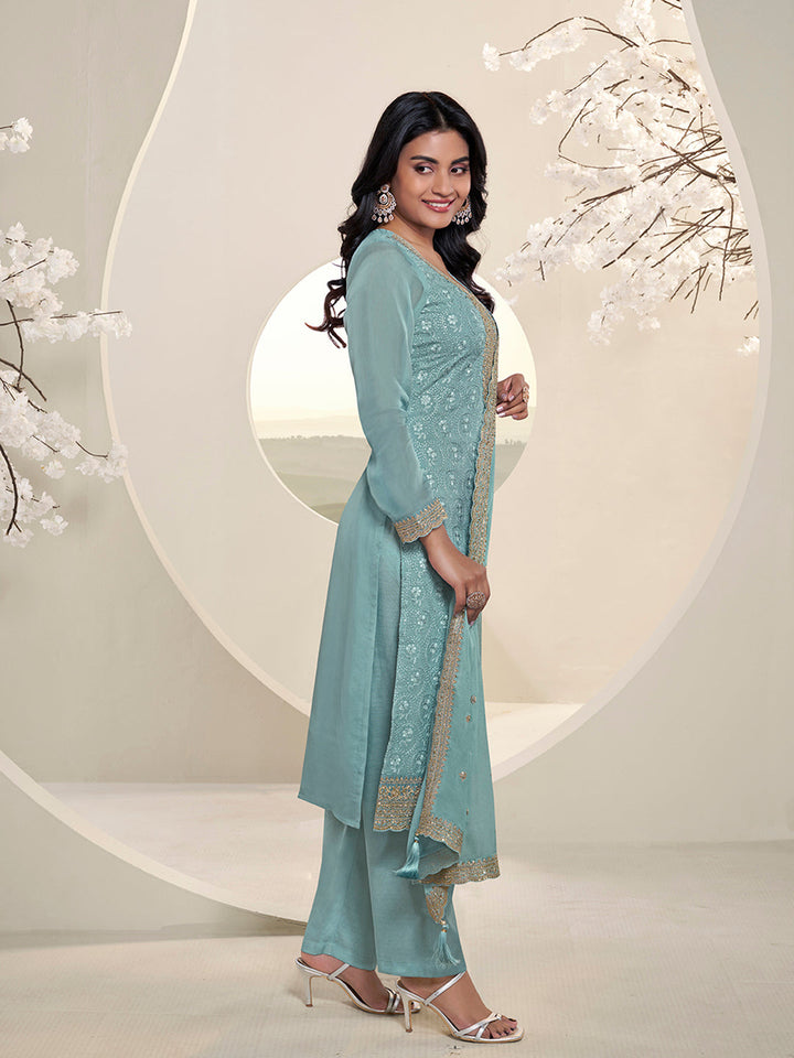 Teal Blue Floral Pattern Schiffli Thread and Sequins Embroidery Kurta Suit Set by Qivii