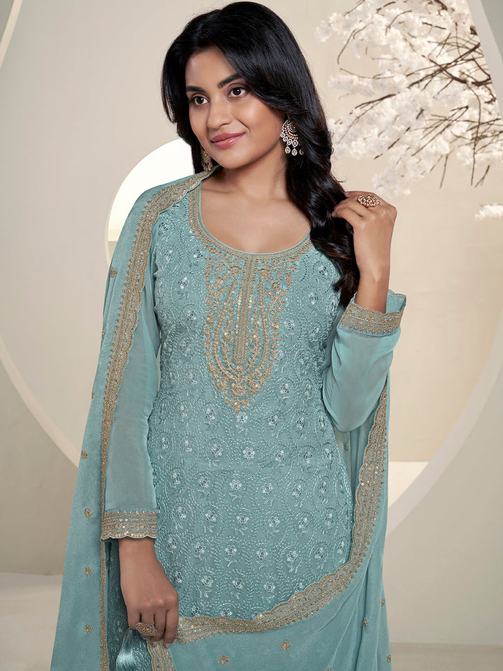 Teal Blue Floral Pattern Schiffli Thread and Sequins Embroidery Kurta Suit Set by Qivii