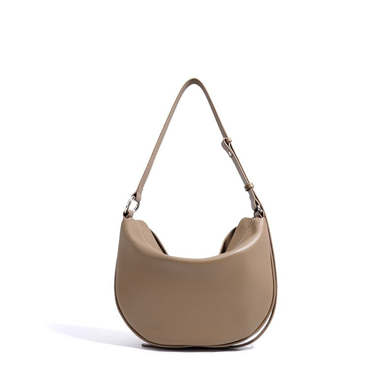 Women's Hush Rider Bucket — Genuine Leather Saddle Bag with Signature Lock Fastening & Convertible Shoulder Strap