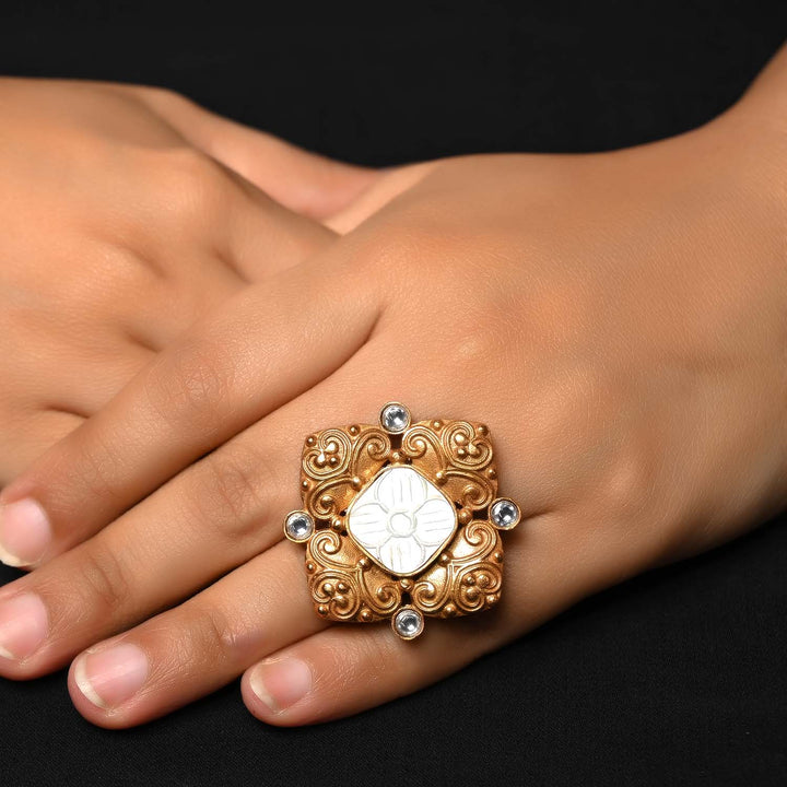 Ganga White Stone Gold Plated Boutique Ring with intricate floral design and sparkling gemstones