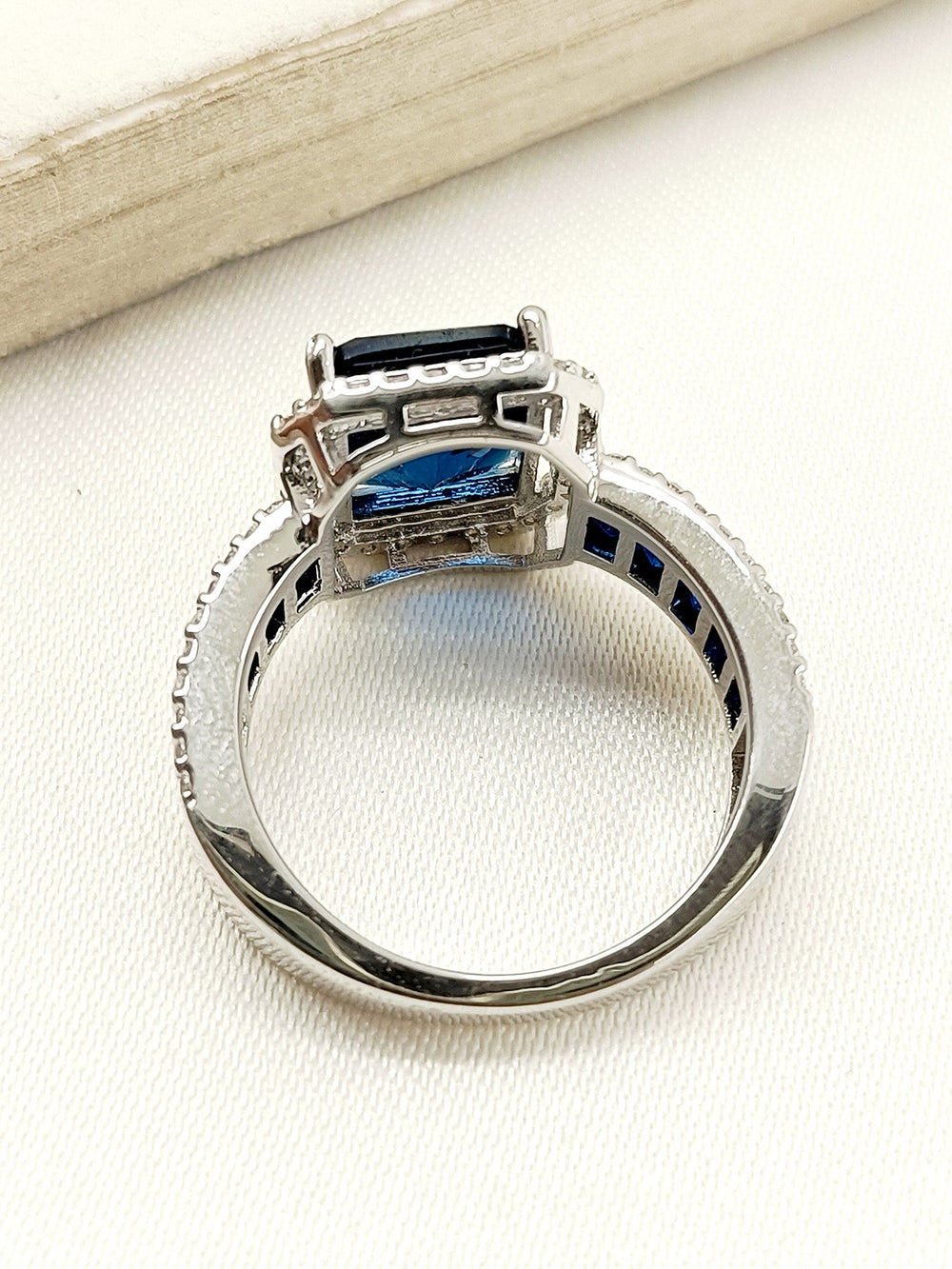 Noorjahan Navy Blue American Diamond Finger Ring with Sterling Silver Band and Intricate Design