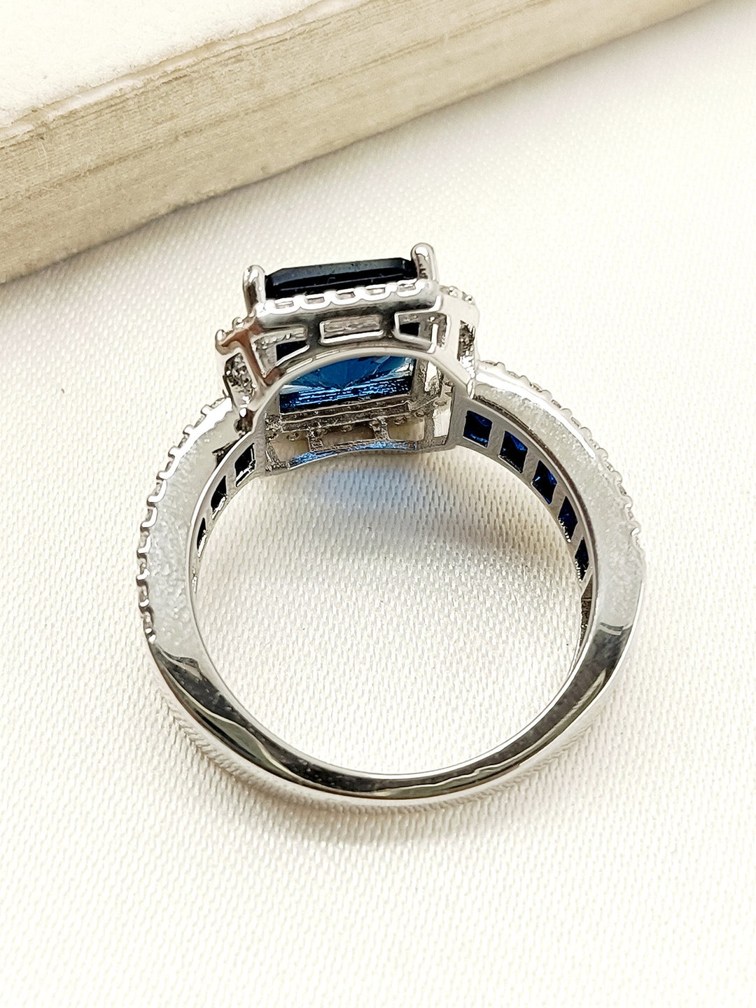 Noorjahan Navy Blue American Diamond Finger Ring with Sterling Silver Band and Intricate Design