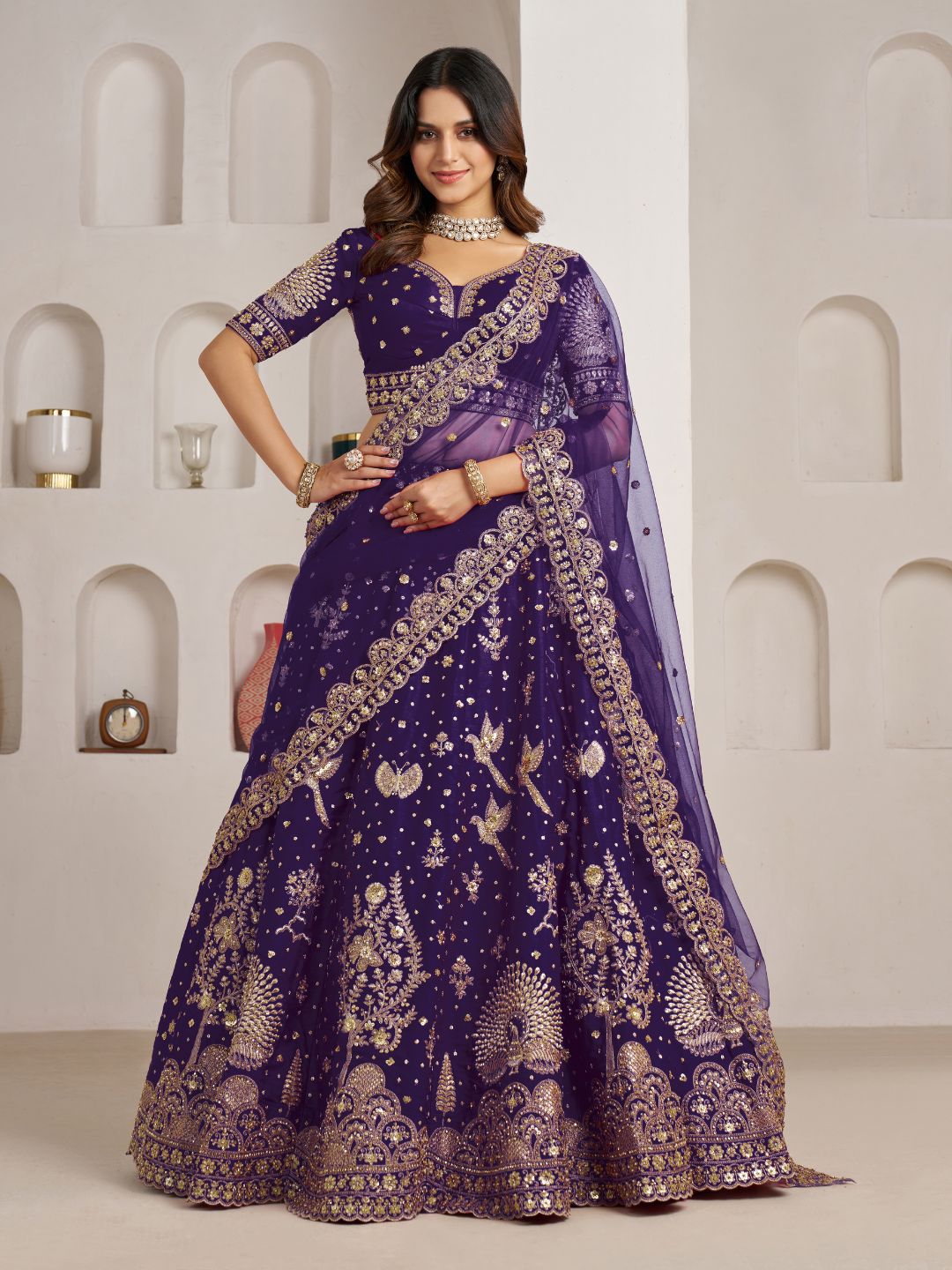 Luxurious Purple Lehenga Featuring Intricate Floral and Bird Designs