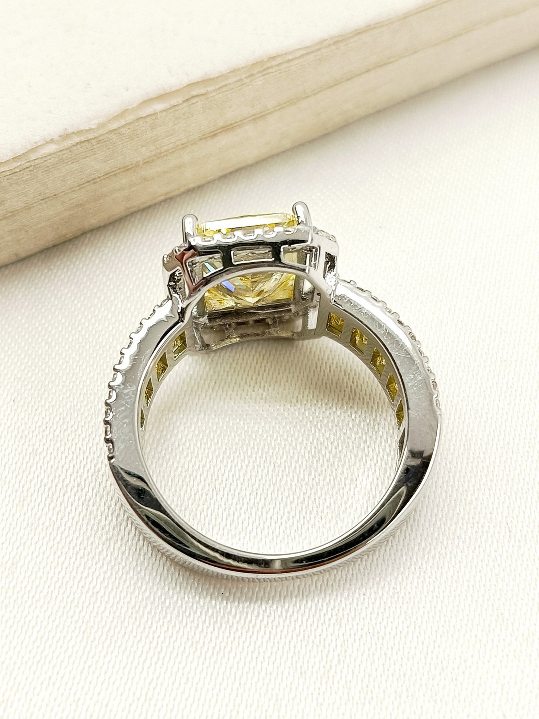  Elegant Akyli Yellow American Diamond Finger Ring with Intricately Designed Setting