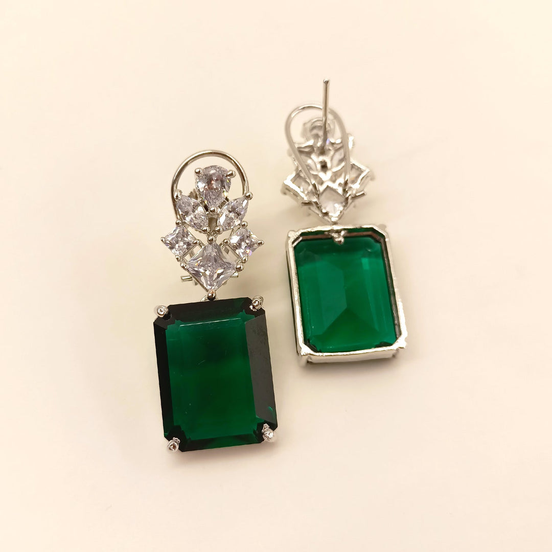  Stunning Pratima Green Emerald American Diamond Silver Plated Earrings for a luxurious and eye-catching accessory