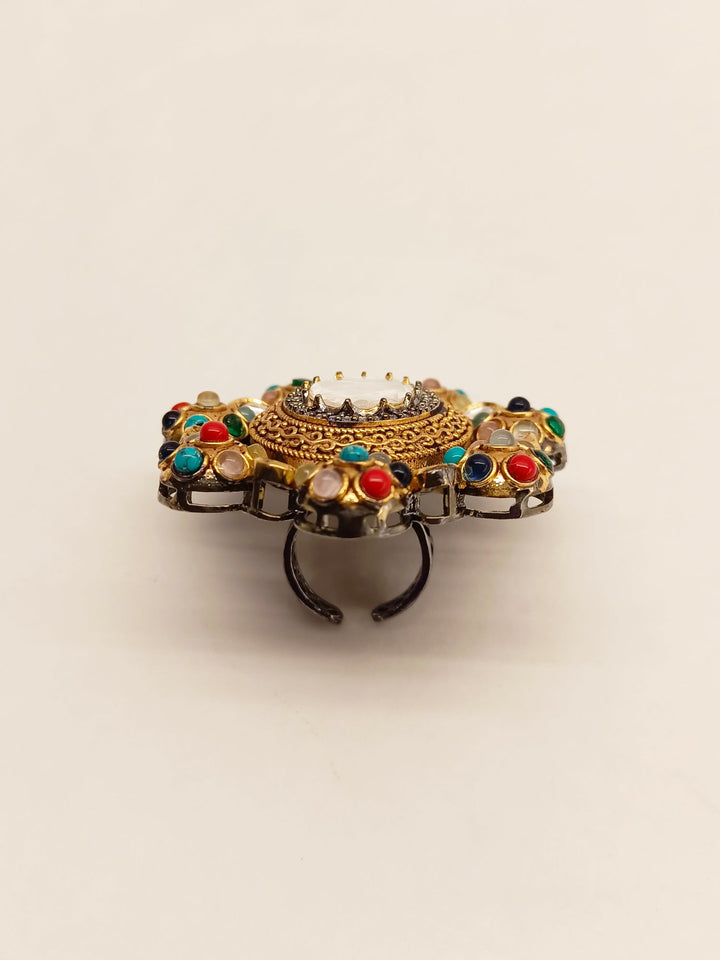 Beautiful Victorian style finger ring with colorful Navratna gemstones in a stunning design