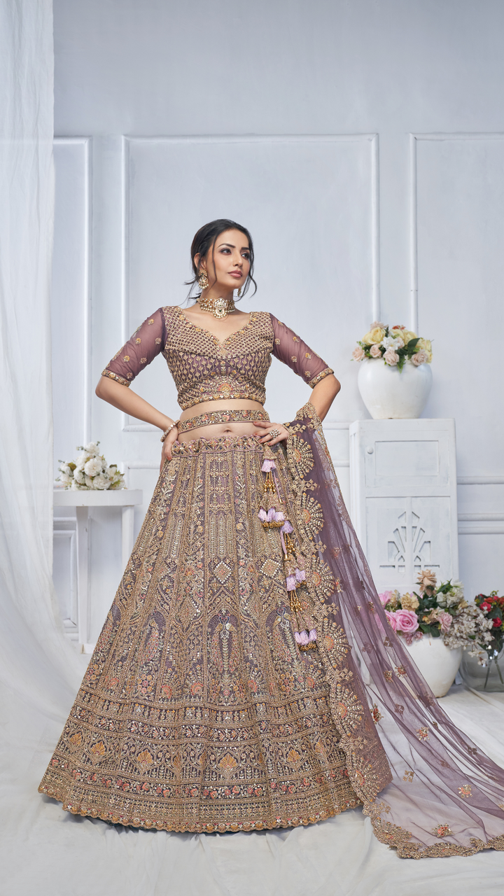 Royal Grandeur bridal  Purple Soft Net Lehenga with Paisley and Peacock Motifs & Heavy Embroidery