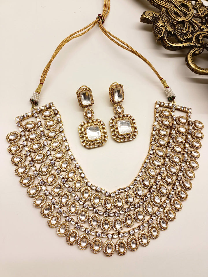 Pankhudi Triple Layerd Kundan Polki Necklace Set