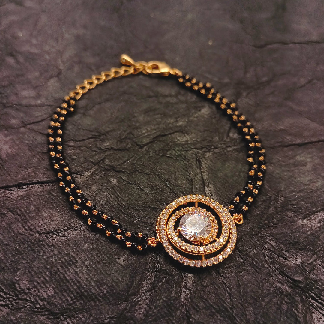 Sarla Diamond Piece With Black Beads Gold Plated Hand Mangal sutra