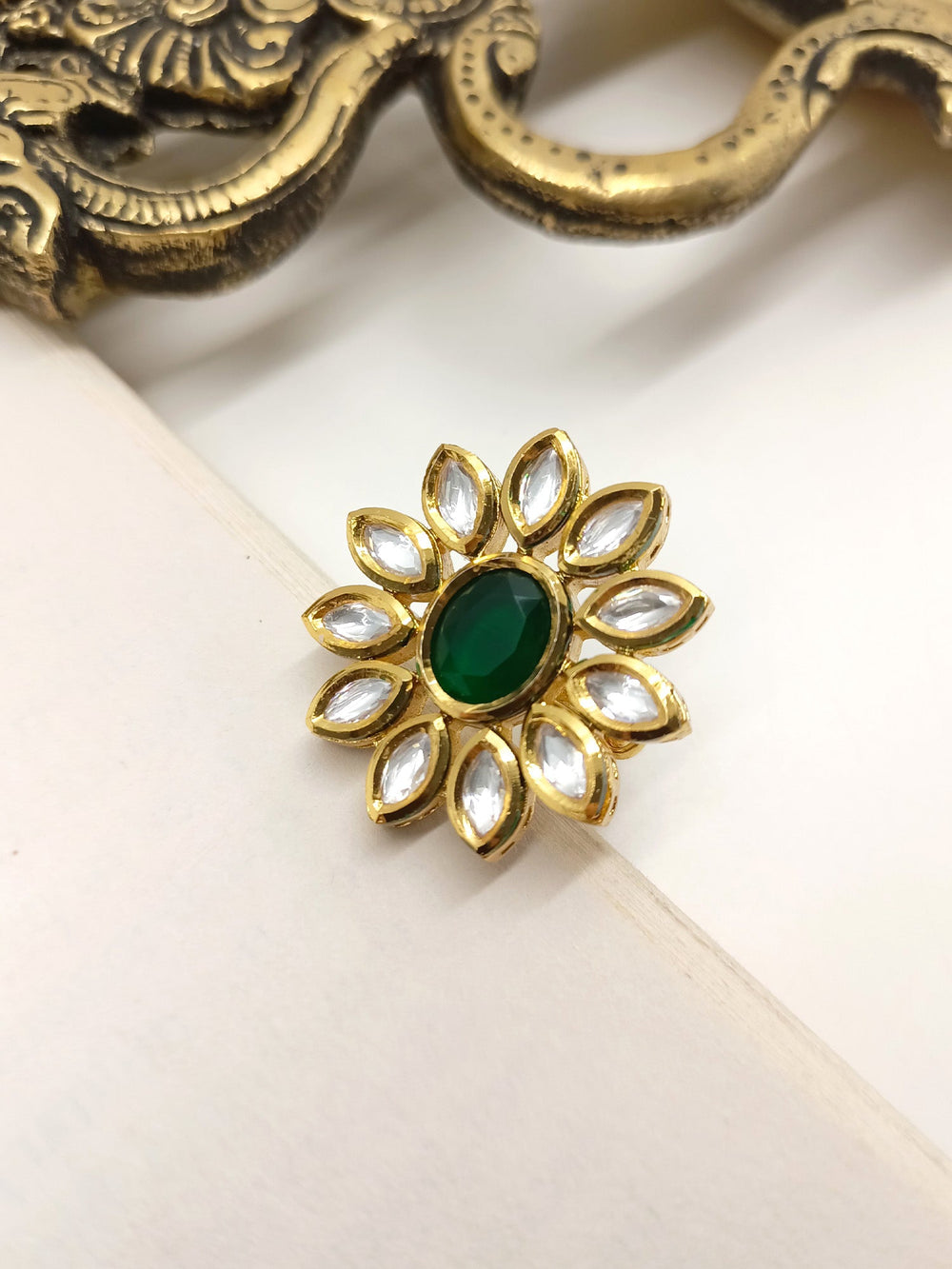 Beautiful Jaspinder Green Kundan Finger Ring with intricate gold design and sparkling gemstones