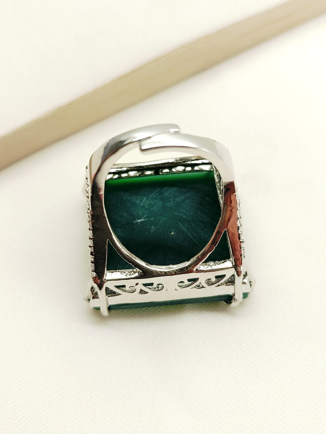  Elegant Nayra Green American Diamond Finger Ring featuring intricate craftsmanship and dazzling green gemstones