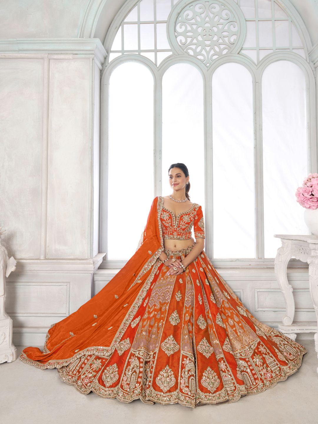 Elegant Rust Lehenga Featuring Rich Raw Silk and Artisan Craftsmanship