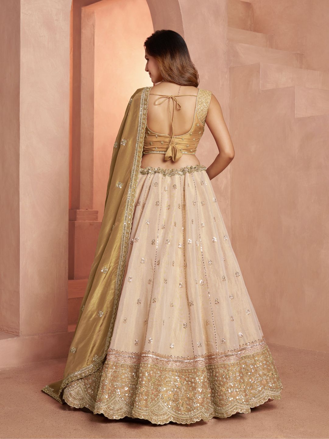 Graceful Gold Lehenga Featuring Handcrafted Embroidery