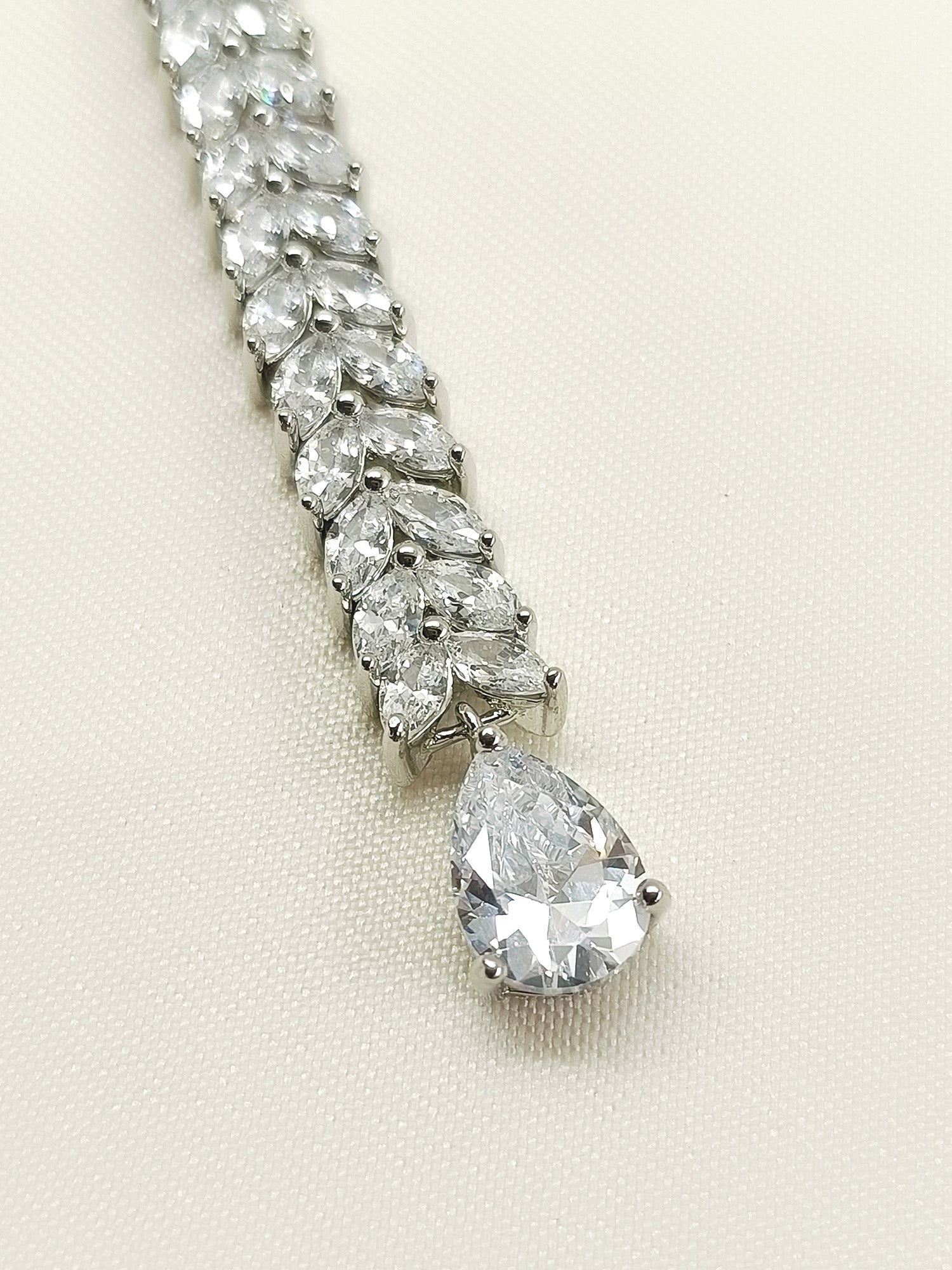 Abhistada White American Diamond Teeka