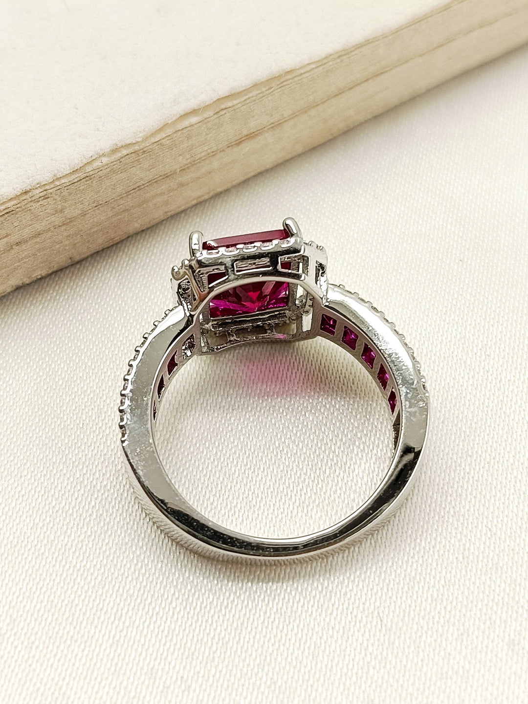  Beautiful rose gold Gemi Ruby American Diamond Finger Ring with a unique and elegant design