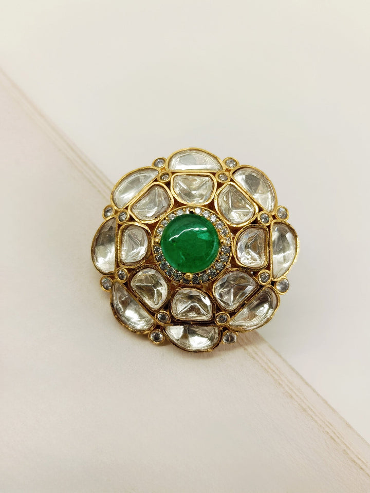  Gorgeous emerald Kundan finger ring featuring dazzling green gemstones and sparkling gold setting