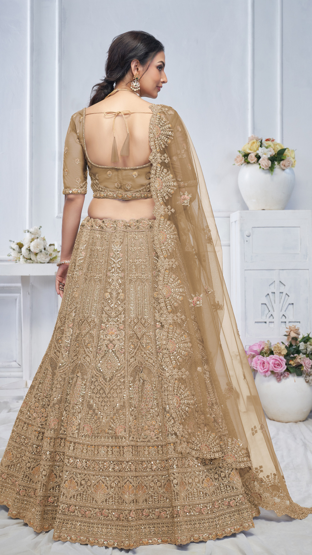 Royal Grandeur bridal Brown Lehenga with Paisley and Peacock Motifs & Heavy Embroidery