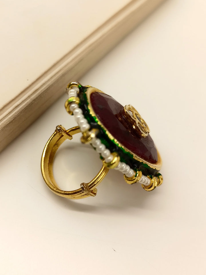 Close-up image of Aaliyah Maroon Kundan Finger Ring showcasing intricate design and vibrant maroon gemstone for elegant and luxurious look