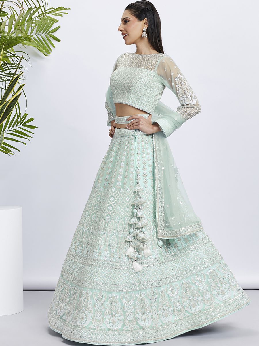 Semi-stitched lehenga choli with intricate turquoise and white embroidery