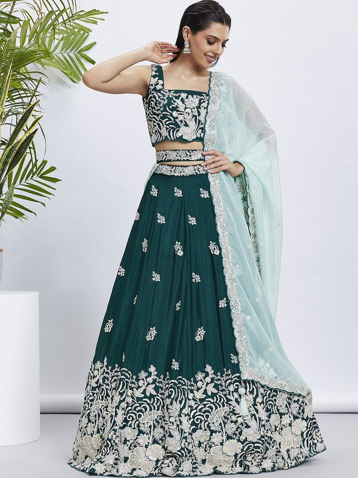 Green pure georgette white sequin and white thread embroidered semi-stitched lehenga choli with intricate detailing and elegant design