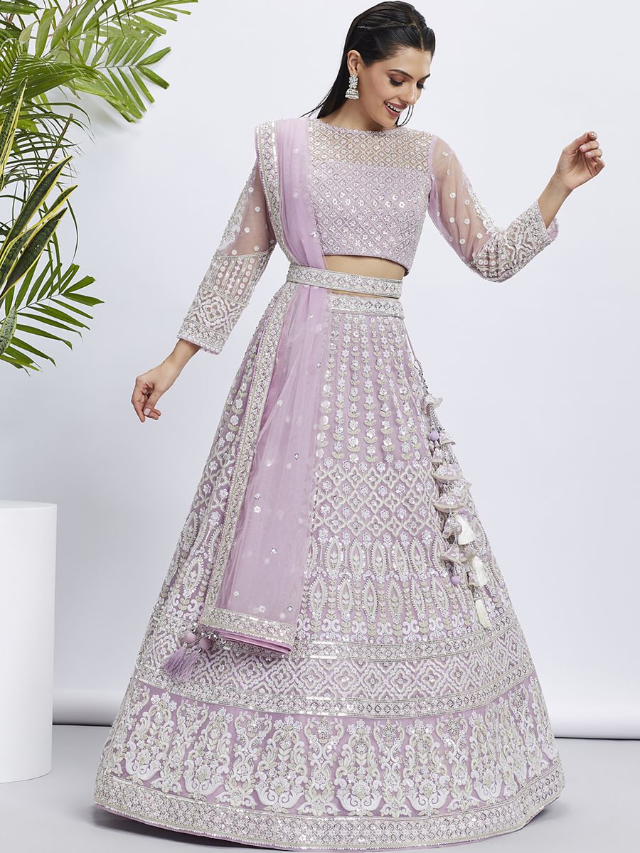 Lavender net semi-stitched lehenga choli with white sequins and heavy embroidery