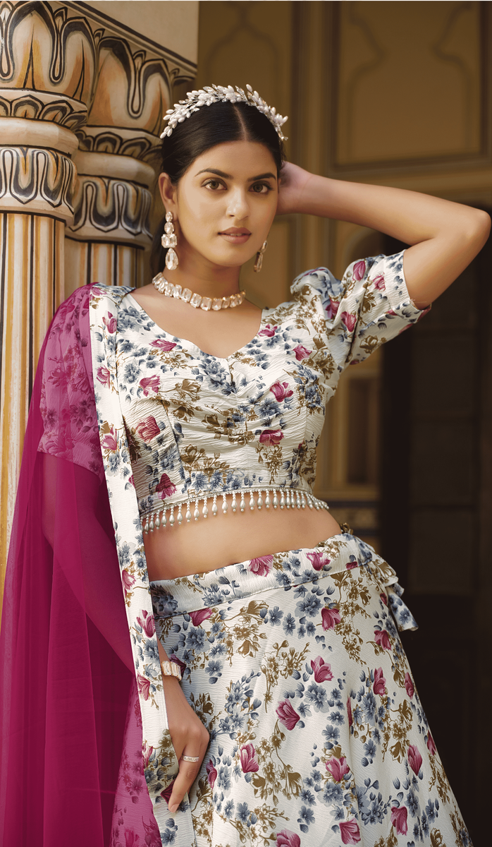 Elegant white art silk fabric lehenga choli adorned with intricate prints