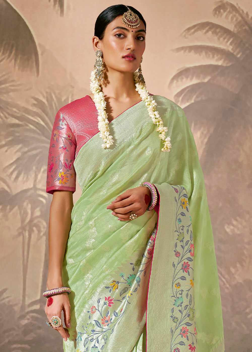 Pastel Green Munga Silk Saree with Zari work & Woven with Resham in Floral Motifs