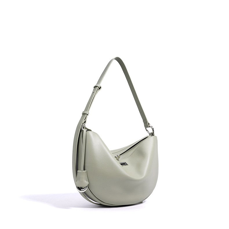 Women's Hush Rider Bucket — Genuine Leather Saddle Bag with Signature Lock Fastening & Convertible Shoulder Strap