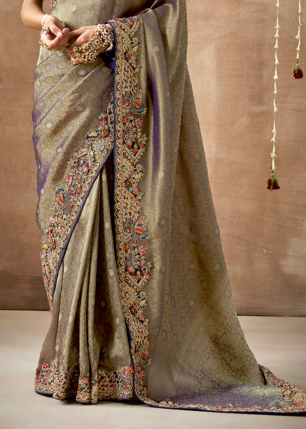 Shades Of Grey & Purple Zari Woven Tissue Dola Silk Saree having Sequence, Pearl, Mirror & Thread Work: Festival Edition