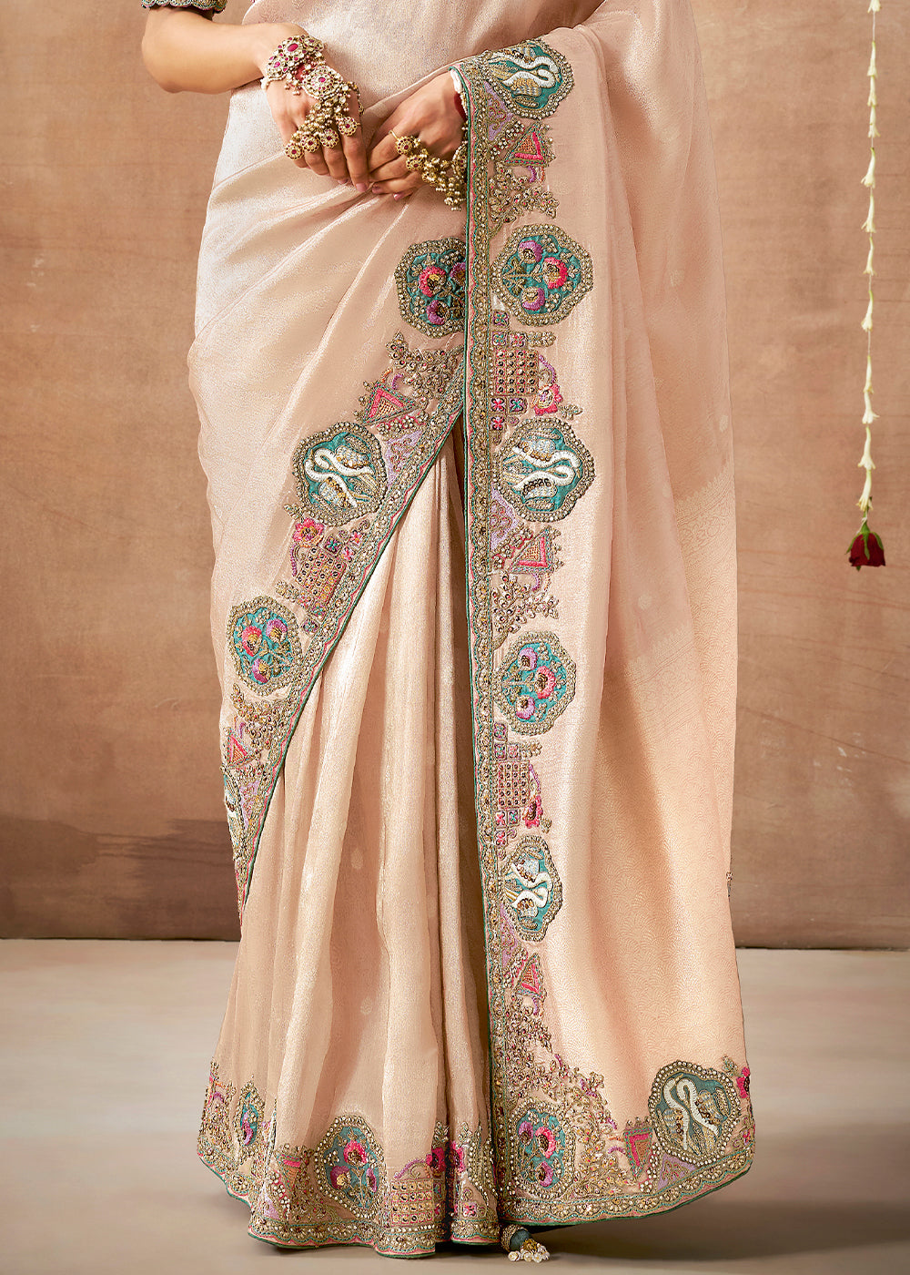 Pale Peach Pink Zari Woven Tissue Dola Silk Saree having Sequence, Pearl, Mirror & Thread Work: Festival Edition