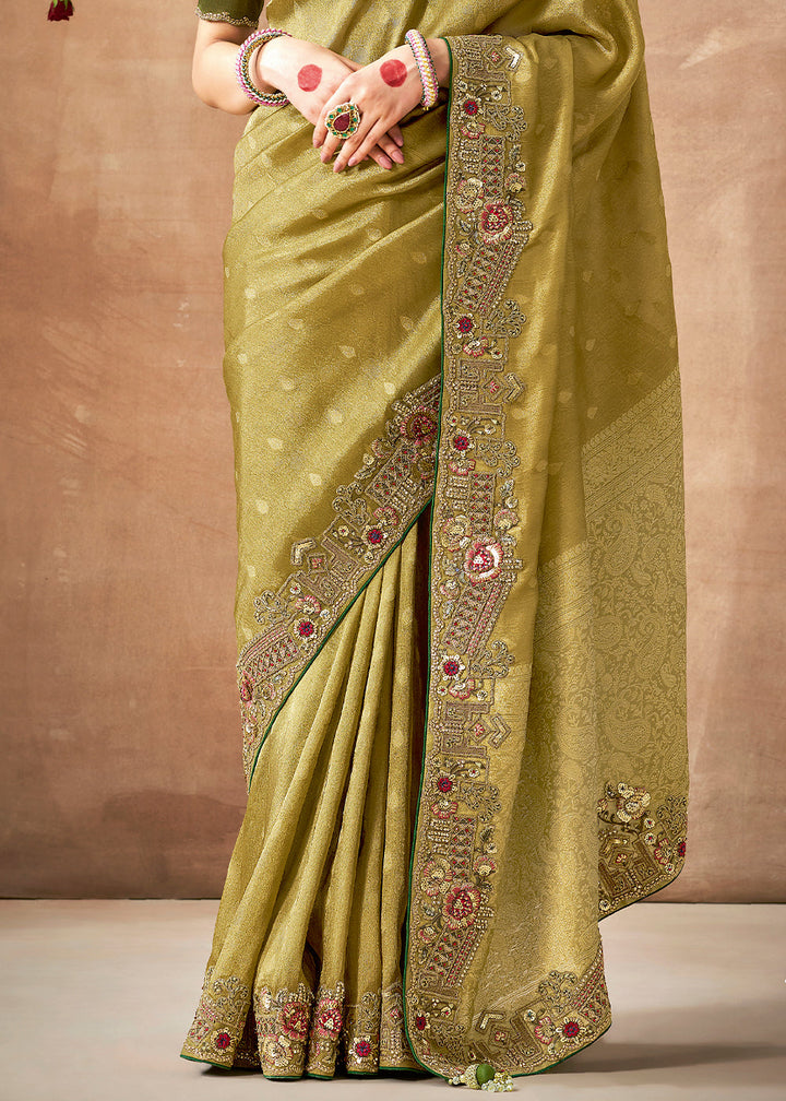 Olive Green Zari Woven Tissue Dola Silk Saree having Sequence, Pearl, Mirror & Thread Work: Festival Edition