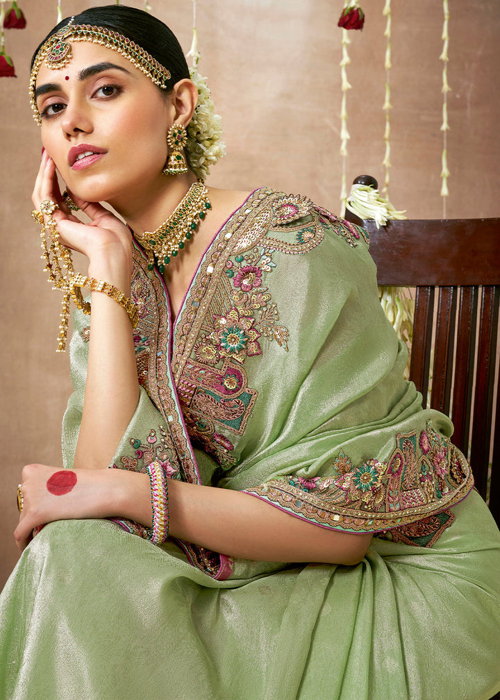 Pastel Green Zari Woven Tissue Dola Silk Saree having Sequence, Pearl, Mirror & Thread Work: Festival Edition