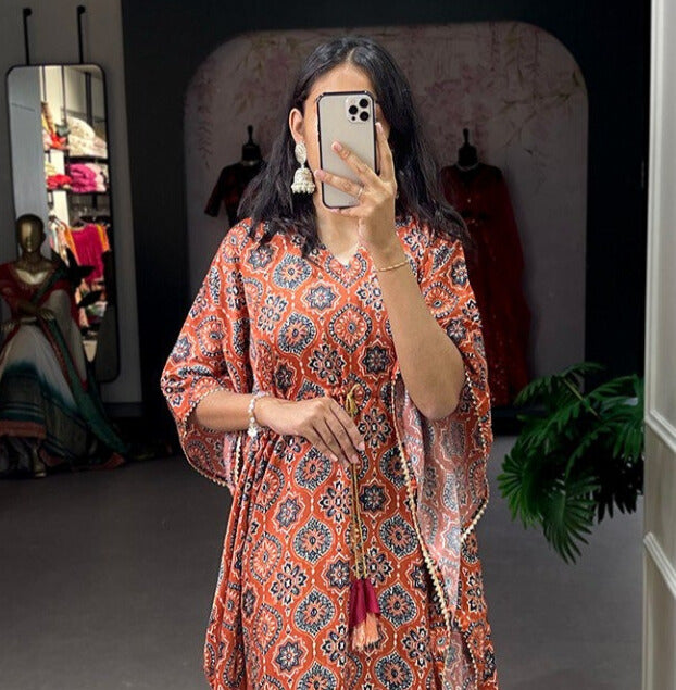 Elegant and vibrant orange kaftan dress with digital print and lace border