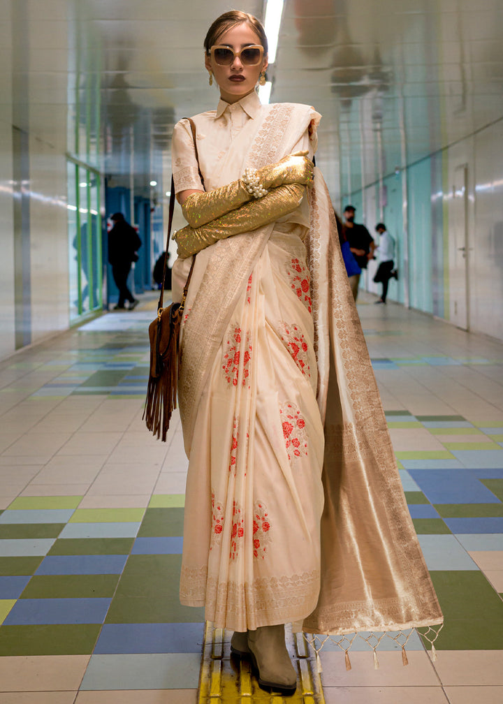 Beautiful cream white handloom woven Banarasi silk saree with intricate floral patterns