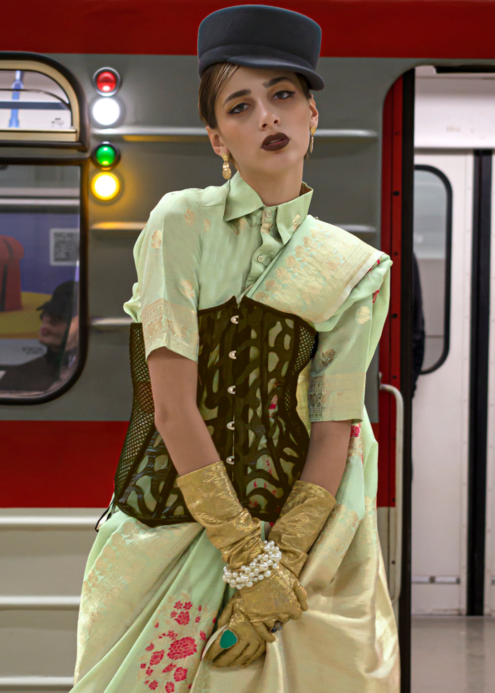 Soft and luxurious pastel green saree with intricate handloom weaving