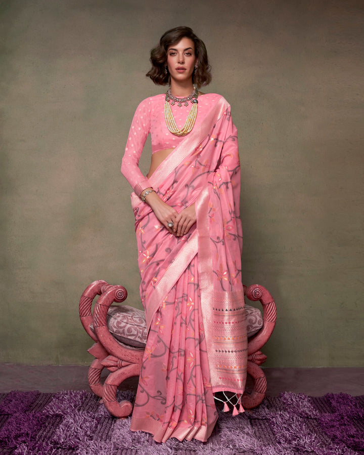 Beautiful pink cotton saree with intricate printed designs for festive wear