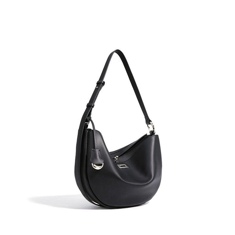 Women's Hush Rider Bucket — Genuine Leather Saddle Bag with Signature Lock Fastening & Convertible Shoulder Strap