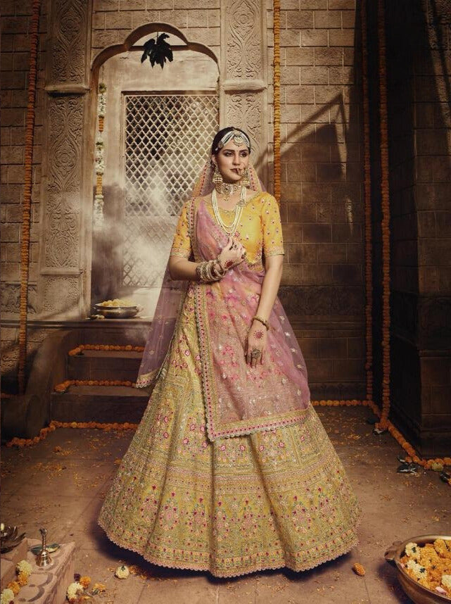 GOLDEN YELLOW AND PINK ZARI HEAVY EMBROIDERED LEHENGA WITH BLOUSE AND DUPATTA