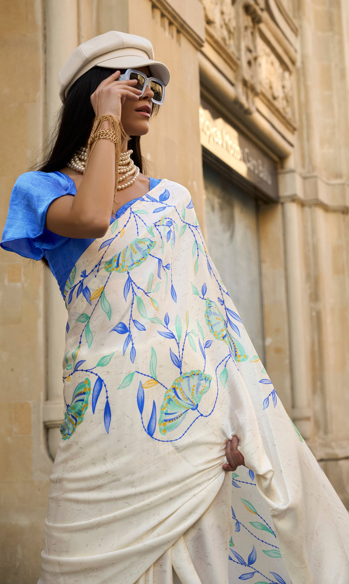 OFF WHITE AND BLUE COLOR SATIN CREPE PRINT SAREE