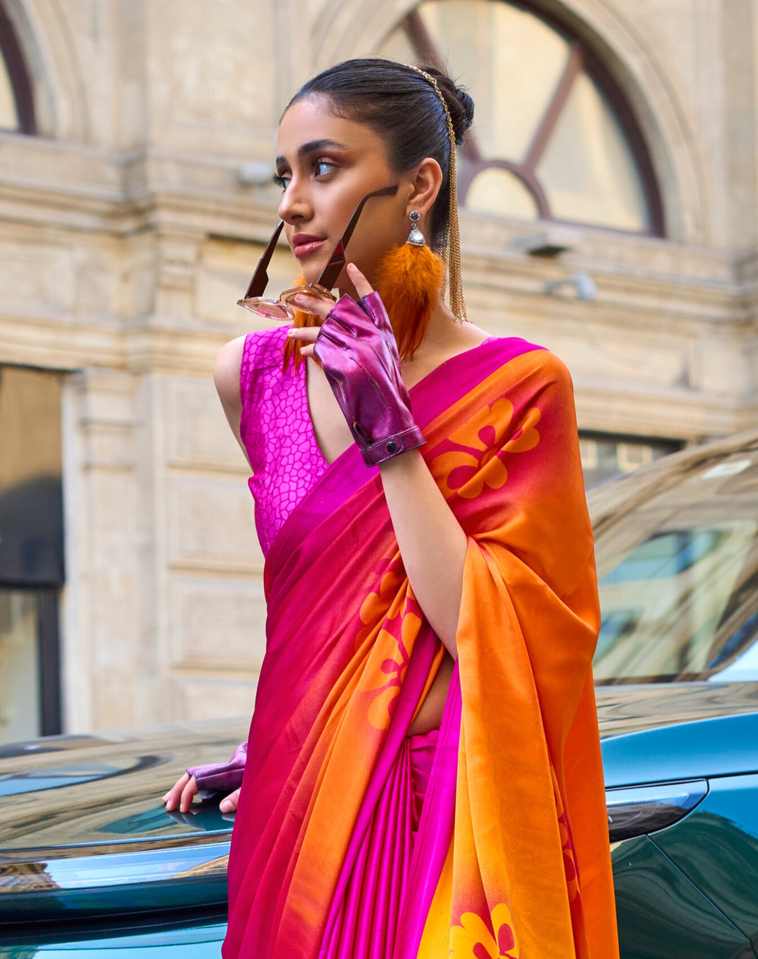  Gorgeous ethnic attire featuring a mix of pink and orange colors with a stunning floral print