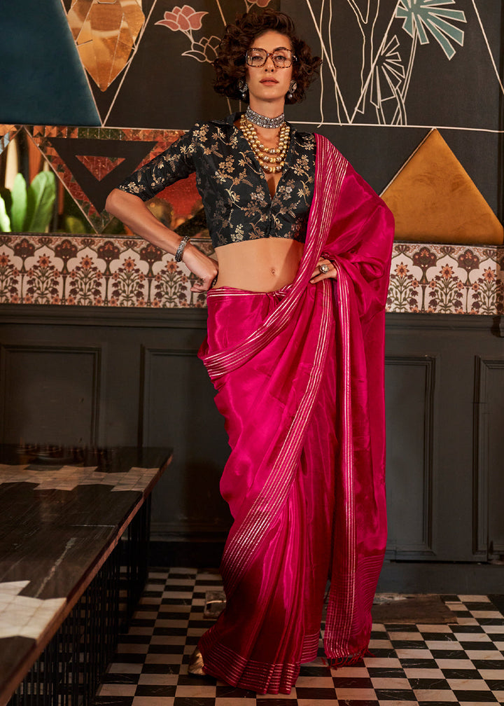 Close up of intricate handloom weaving on Wild Berry Pink Viscose Satin Saree