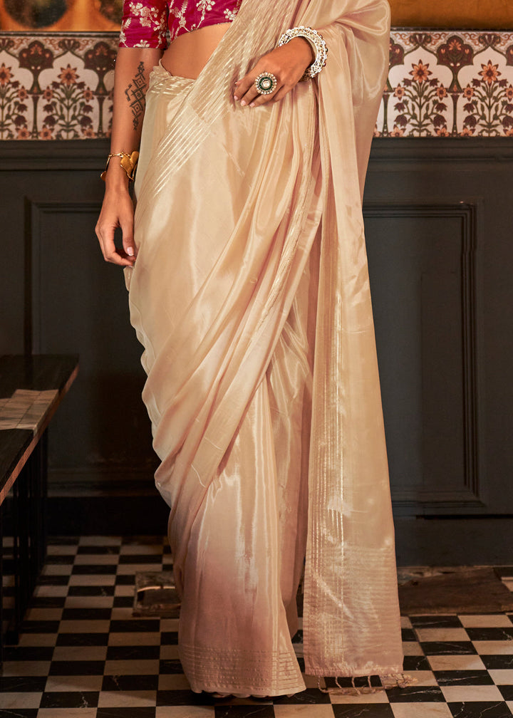 Beautiful beige brown viscose satin saree with intricate gold embroidery and floral motifs, perfect for any special occasion or event