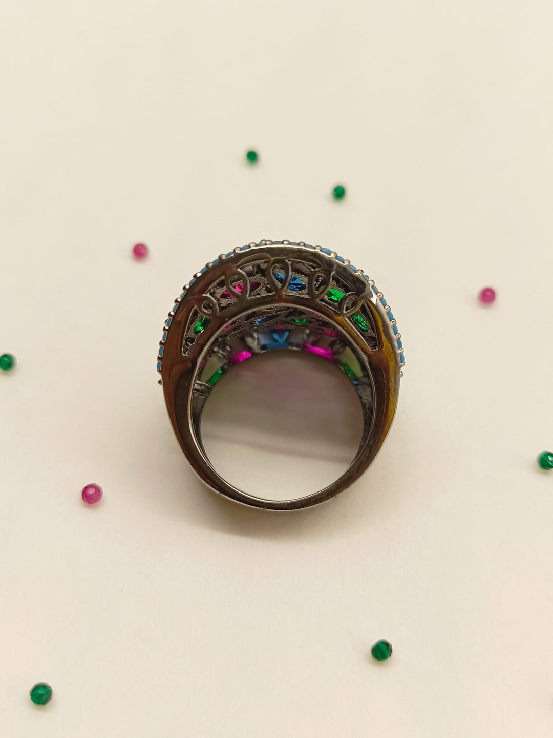  Exquisite Gulika Multi Colour Victorian Finger Ring showcasing intricate detailing and stunning purple and pink gemstones