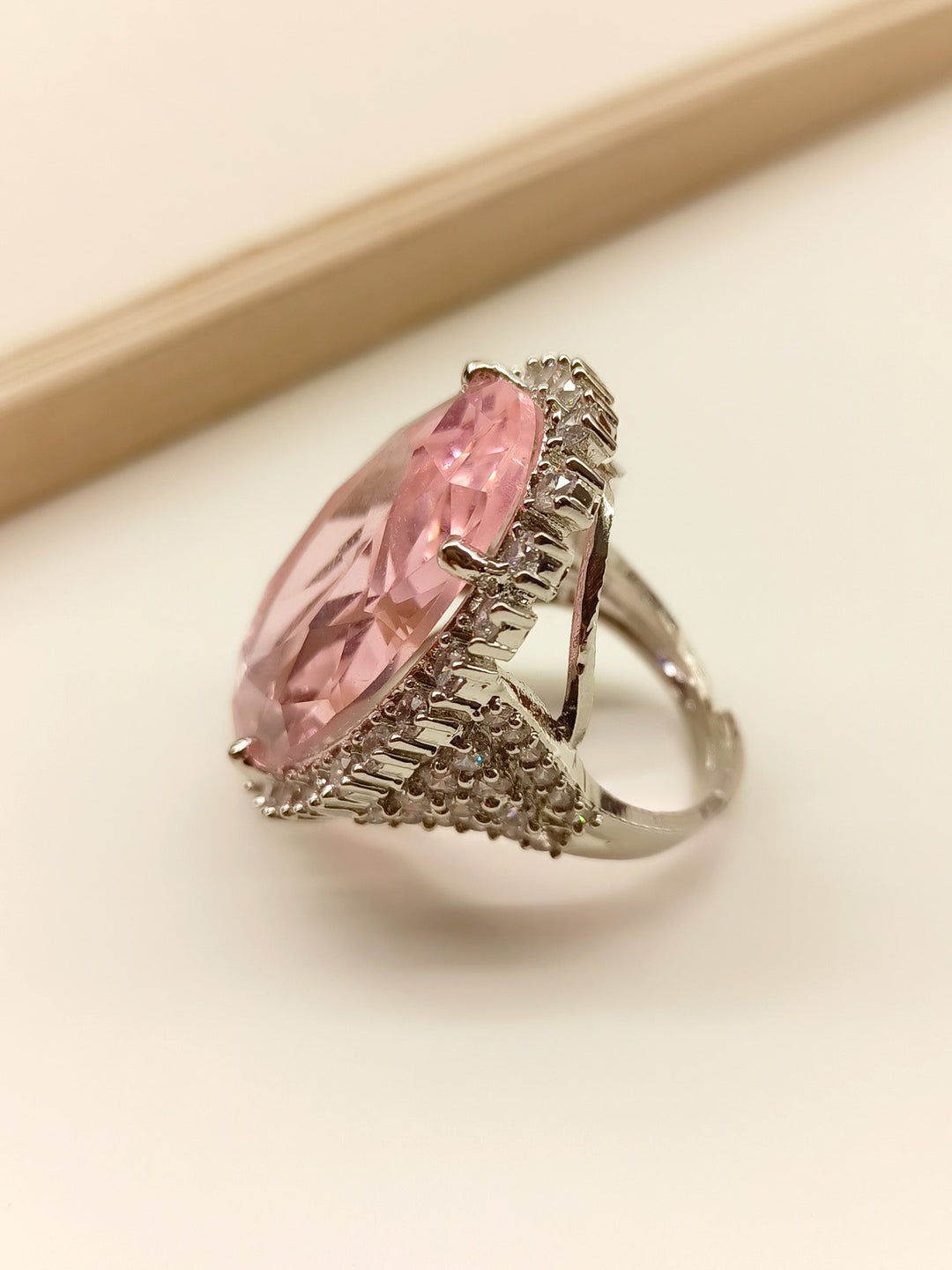 Beautiful Kesar Pink American Diamond Finger Ring with intricate design and sparkling gemstones