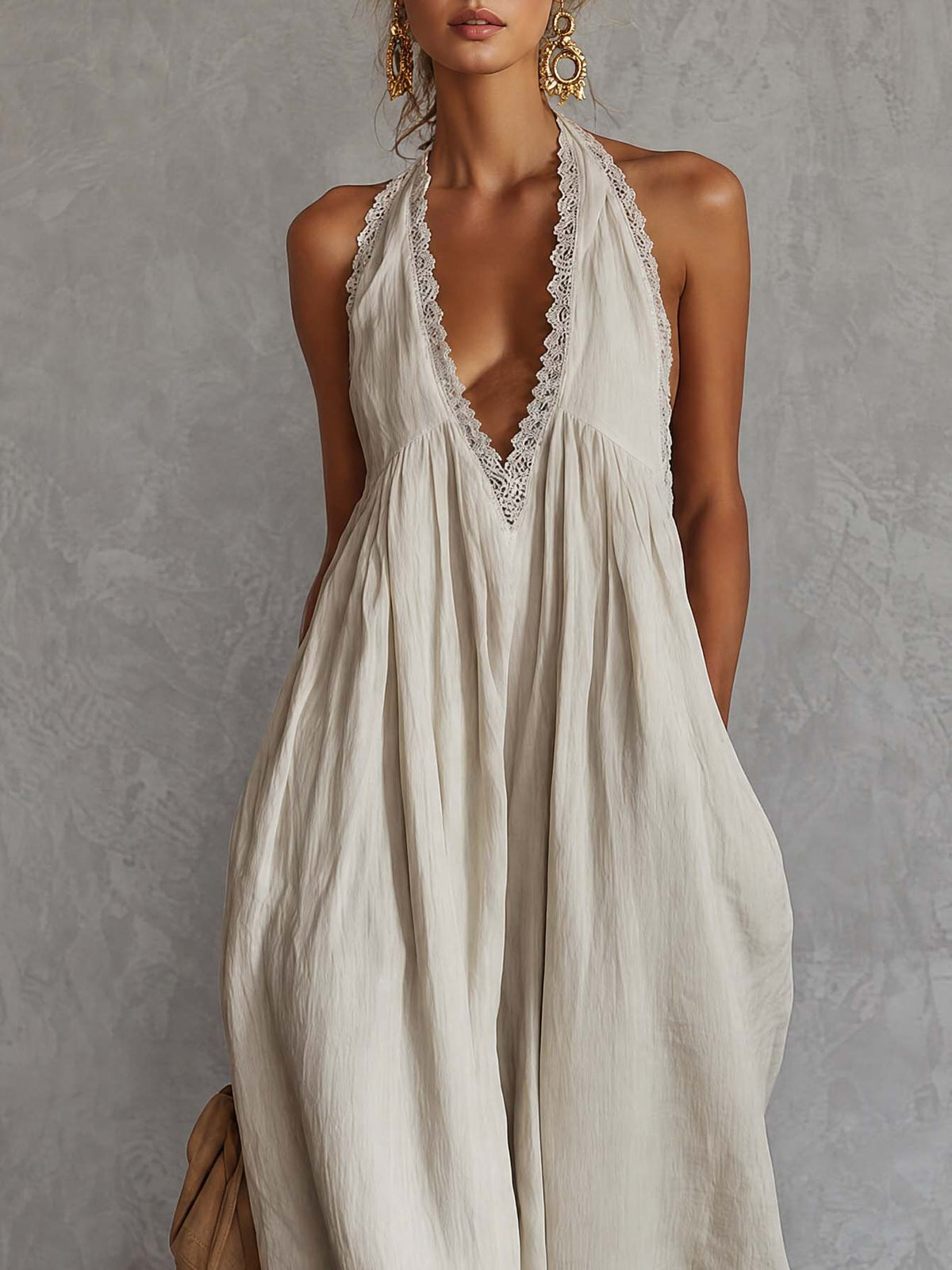 Off-white cotton maxi dress with V-neck, lace trim, sleeveless, bohemian style by Oyrosy Clothing, featuring a relaxed fit and flowing fabric.