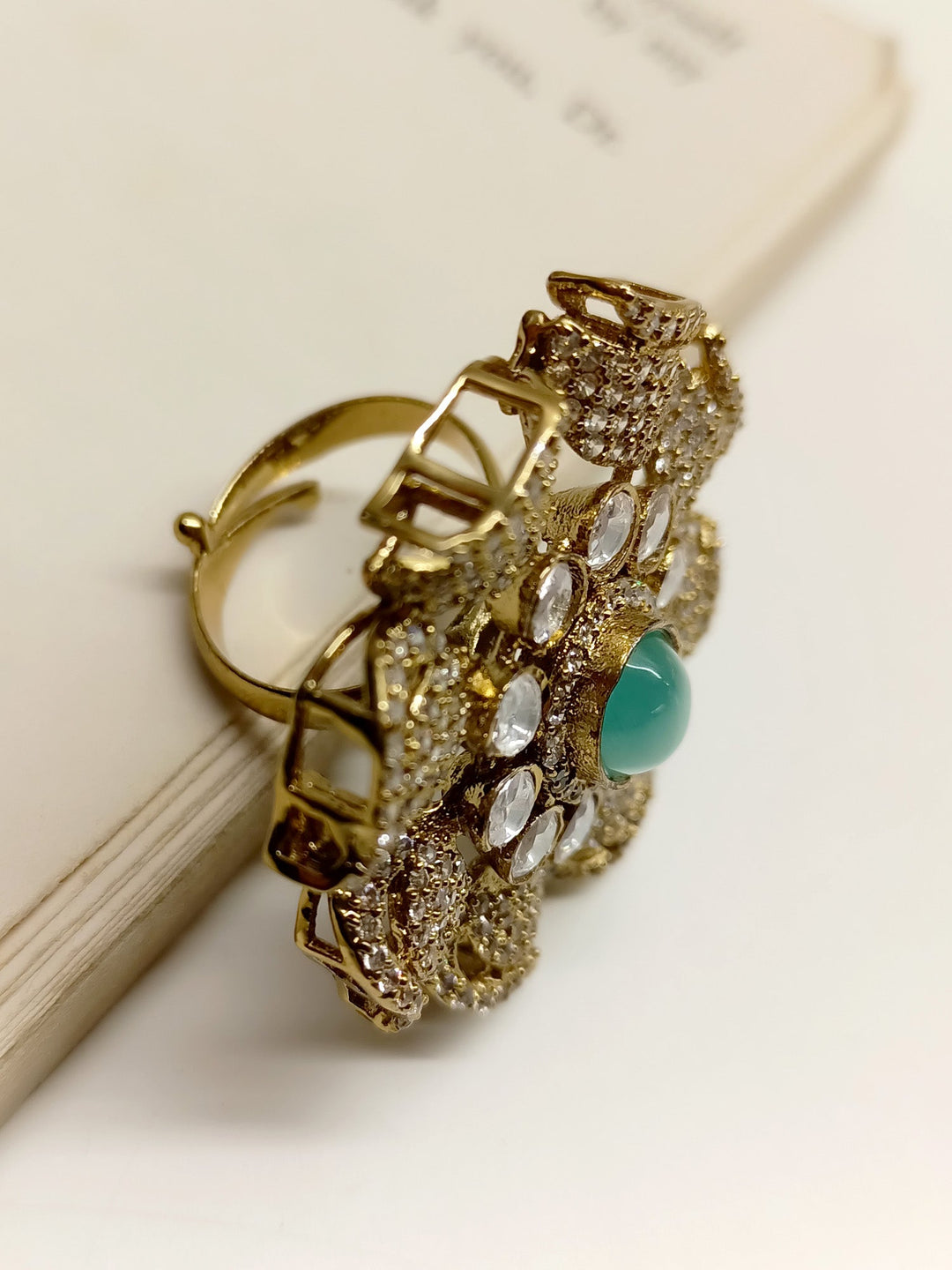 Elegant Vasuda Mint Green Victorian Finger Ring featuring intricate filigree work and a stunning mint green gemstone centerpiece