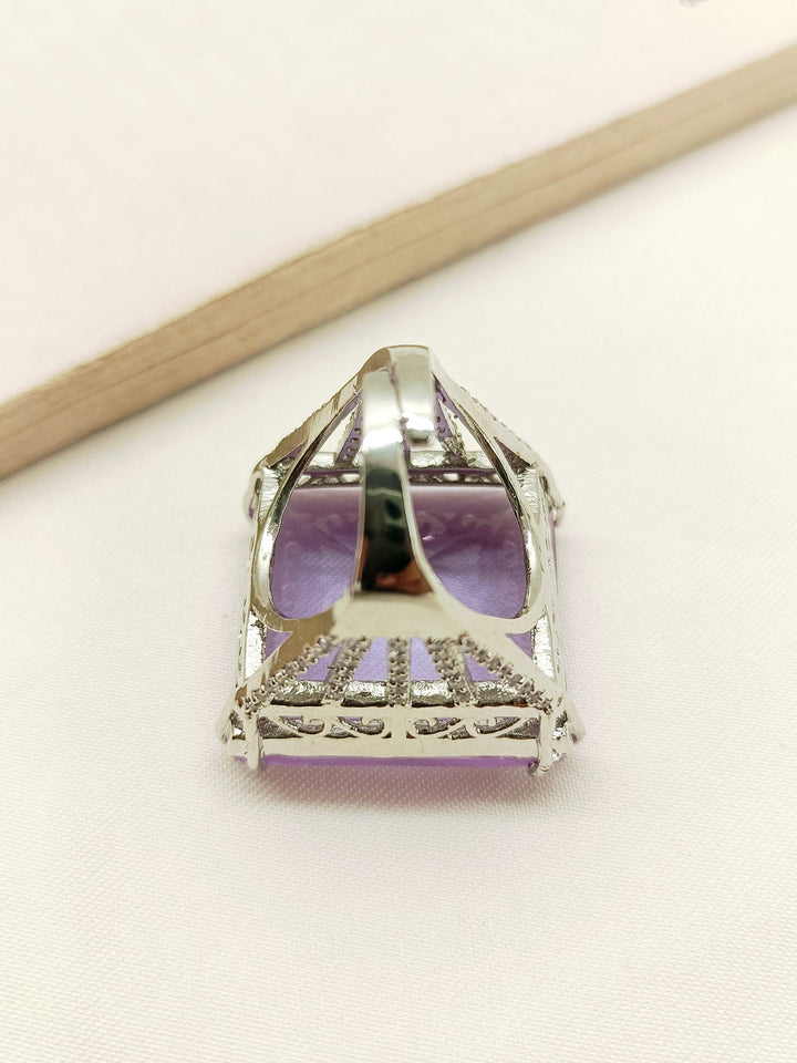  Hand wearing Ireland Lavendar American Diamond Finger Ring, showcasing its elegant and timeless design