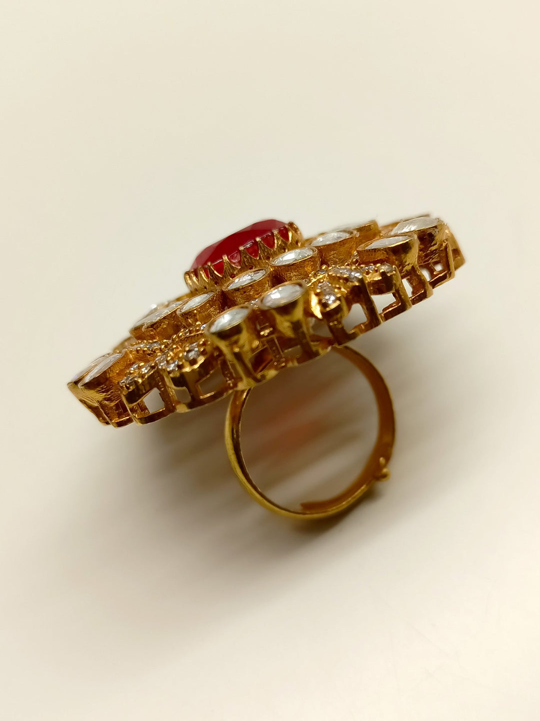 Vanshika Red Victorian Finger Ring, a stunning statement piece with intricate details and a vibrant red gemstone centerpiece