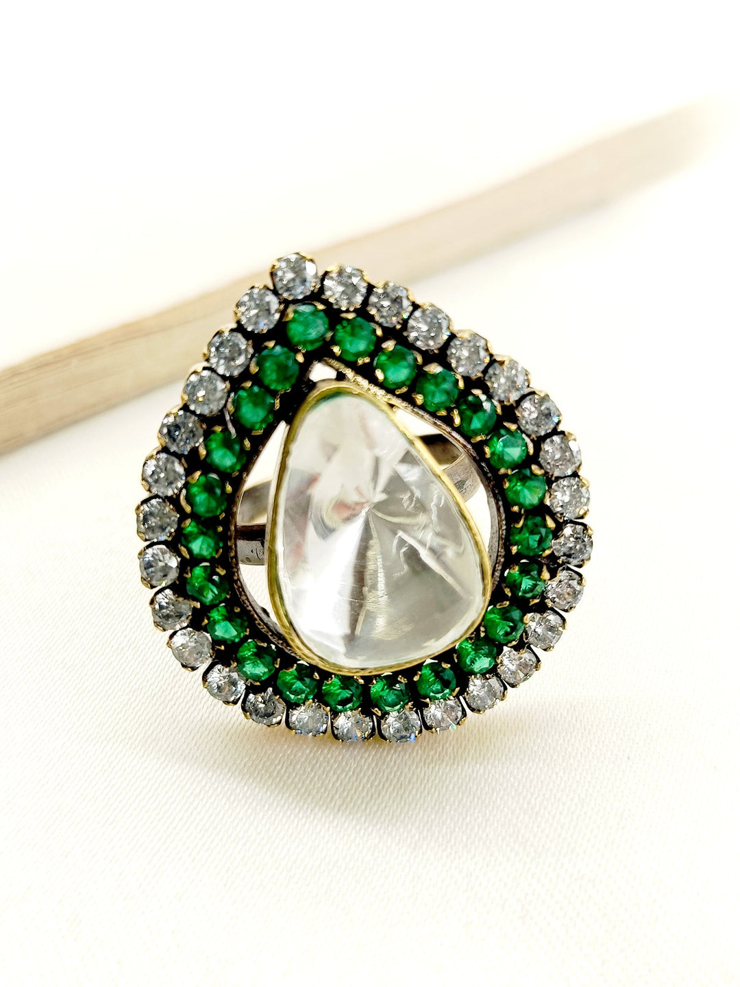 Celia Green Victorian Finger Ring with intricate floral design and emerald stone in antique gold finish